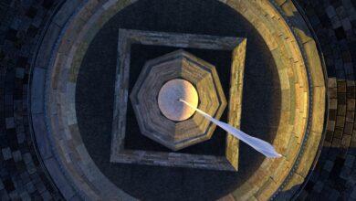 An aerial view of a circular object with a white object in the center